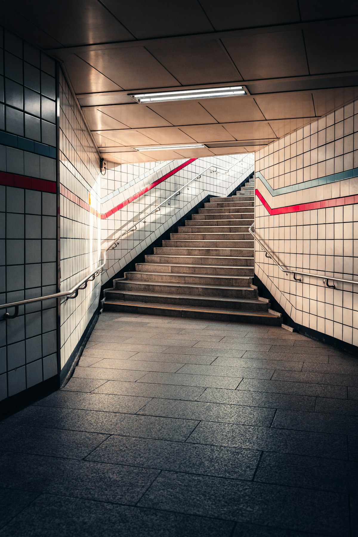 Tiled stairway leading up from a Seoul subway underpass