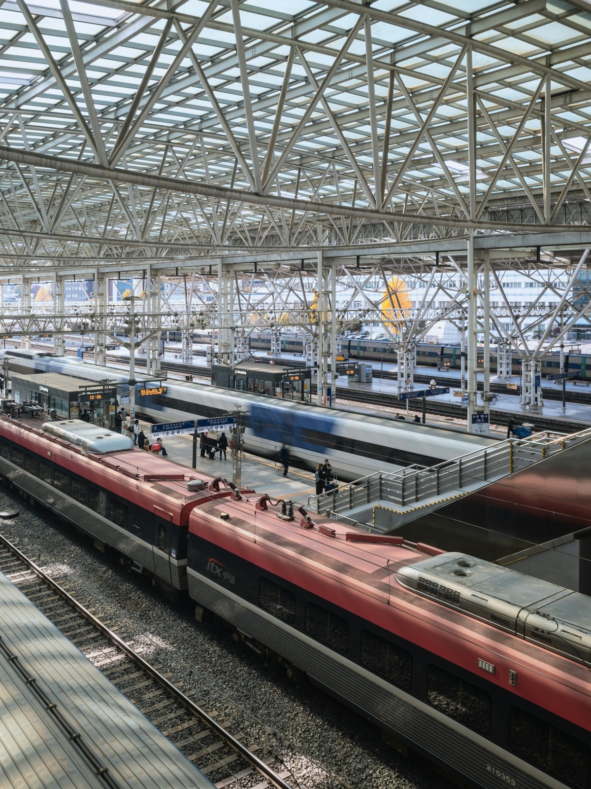 Korean trains waiting under the glass roof of Seoul Station